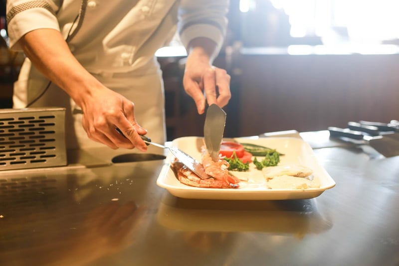 Young chef cooking in the kitchen